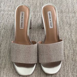 Ladies shiny silver heels. Never worn.